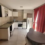 Dean Funes SUITES 108